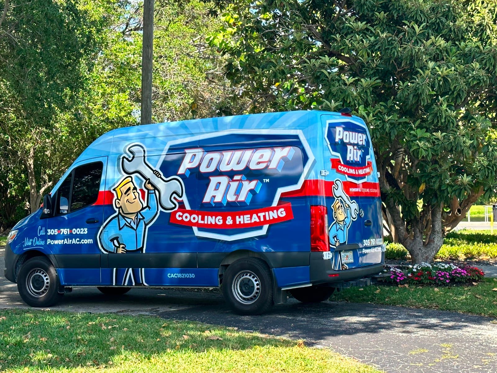 Power Air service van parked in a South Florida residential neighborhood
